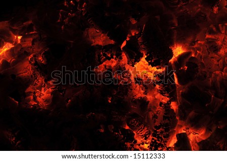 Glowing red hot embers - fire background texture