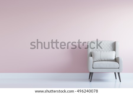 White comfortable arm chair in interior living room with pastel pink wall for copy space. Minimal interior.