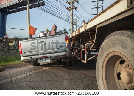 AYUTTHAYA, THAILAND - JULY 06: Rescue forces in a deadly car accident scene on July 06 2014. Road accident coupe gray hit the SUV car on the freeway in rush hour.