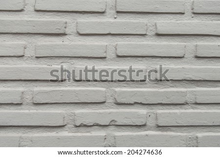 Grungy textured white horizontal stone and brick paint architectural wall and floor inside old neglected and deserted interior, masonry and carpentry brickwork concept
