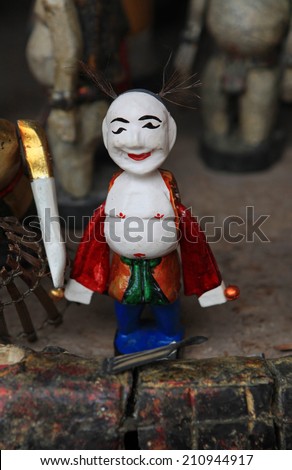 The Joker (Chu Teu in Vietnamese) - one of the most well known character of the traditional water puppets performance shows at  a theater in Hanoi, Vietnam