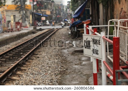 Hanoi, Vietnam - Mar 15, 2015: Usual life beside the railway track. It's dangerous to live here but people don't have many choices.