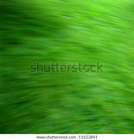Green grassy background with motion blue in square format