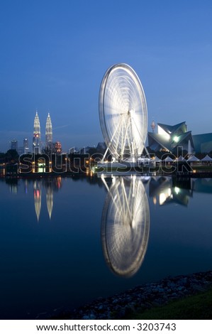 The Kuala Lumpur \'Eye on Malaysia\' with the Twin Towers in the Background
