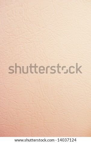 pink sheet of paper with a texture