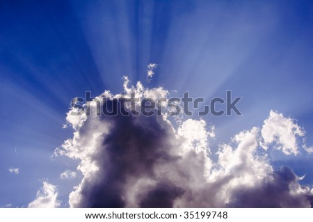 Romantic sun beams over morning clouds. Heaven over us.
