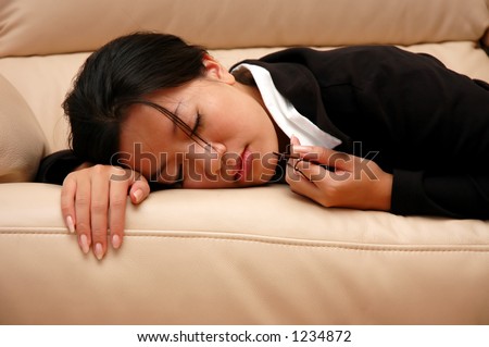 woman taking a nap on the couch