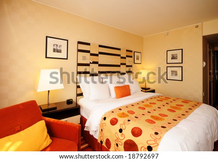 Spacious and nicely decorated room. Orange Theme with King Bed