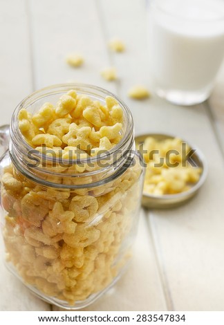 sugar-coated corn flakes with milk background