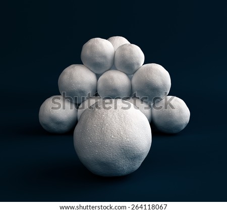 Snow balls stacked in a pile on a dark blue background, to play in the Snowball