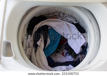 Washing machine with dirty clothes inside