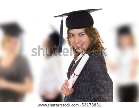 Young women after graduation with diploma in right hand, other students blurry in background