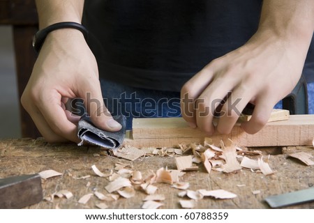 Young man doing carpentry work