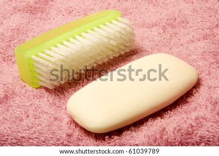 Soap, toothbrush and towels for washing hands