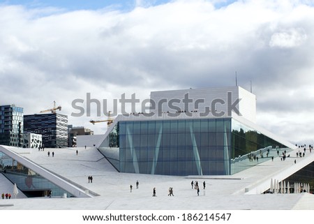 OSLO, NORWAY - SEPTEMBER 28: OSLO, NORWAY - SEPTEMBER 28: Oslo Opera house with great exterior is the home of the Norwegian National Opera and Ballet on September 28, 2013 in Oslo, Norway