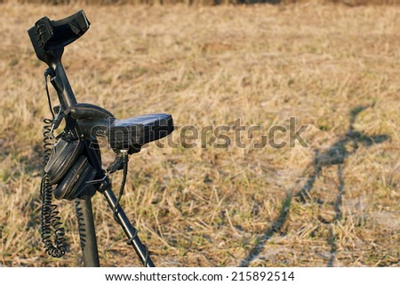 Metal detector in the field, special equipment for treasure hunt