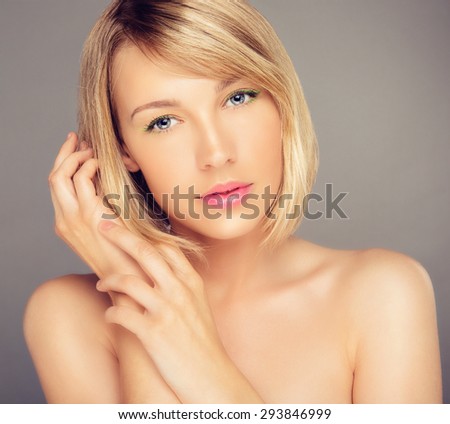 Portrait of Beautiful Blonde Woman with Blonde Hair and a Diamond Ring. Close Up