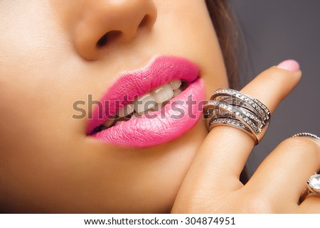 Pink Lips with Diamond Jewelry. Fashion Make-up, Style and Cosmetics