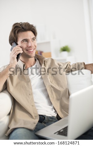 man at phone paying online ordering