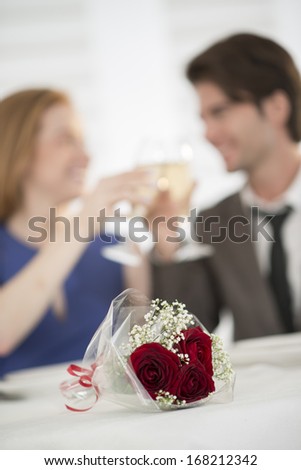 romantic dating at restaurant focus on flower bouquet romantic dating at restaurant focus on flower bouquet