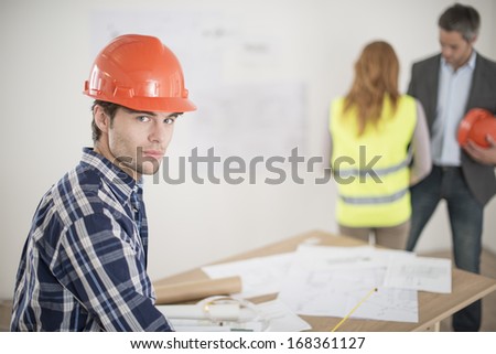 portrait of a foreman during a meeting about a build project