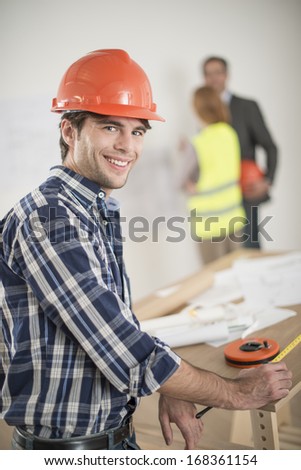portrait of a foreman during a meeting about a build project