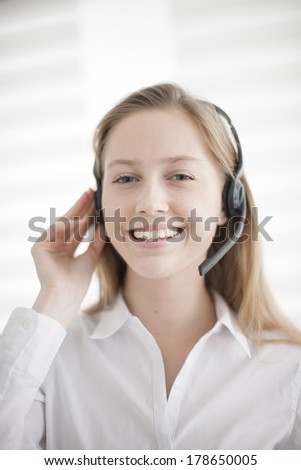 portrait of a beautiful young woman with headphones