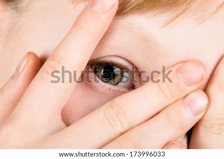 Girl covering eyes