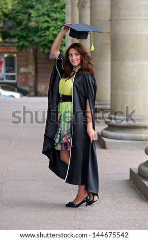 A university graduate in robes