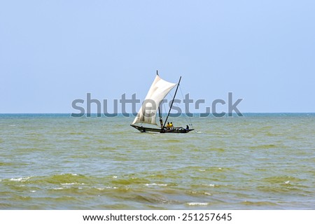 Fishing sailboats on the horizon of the Indian Ocean