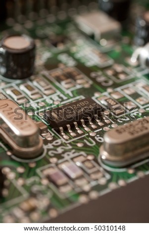Closeup of integrated electric circuits on computer module