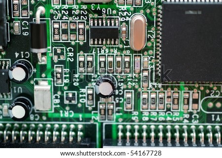 Closeup of green micro circuit board of computer with integrated chipset