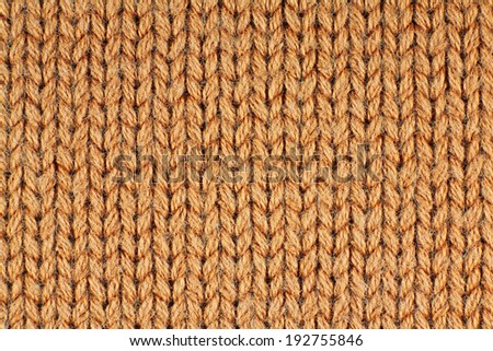 Orange knitting pattern for a winter wool sweater