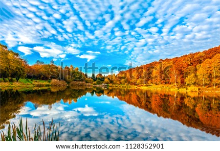 Autumn forest lake reflection landscape. Forest lake trees in autumn season panorama. Autumn lake in autumn forest.