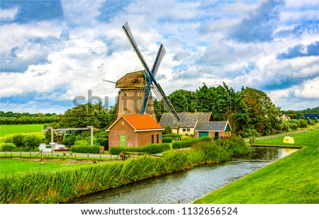 Windmill farm river landscape. Windmill dutch farm scene. Netherlands windmill farm view