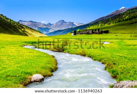 Mountain river valley landscape. River valley in mountains. Beautiful mountain river valley panorama