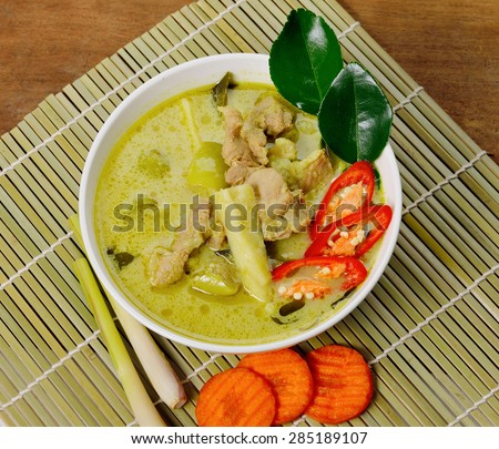 pork Curry , Thai cuisine on wooden background.