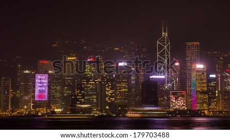 Hong Kong, China - January 17, 2014: Cityscape with famous landmark of Hong Kong night. Shooting from Avenue of Stars Kowloon