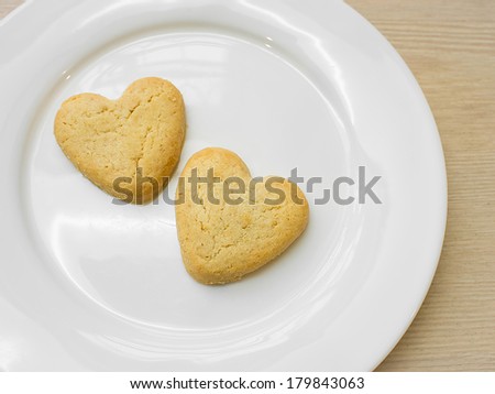 Heart cookies on white plate