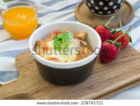 Set of breakfast with toasts , egg, sausage, coffee and fruits