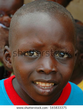 GEORGETOWN, GAMBIA - SEPTEMBER 12: Portrait of unidentified Mandinka child on September 12, 2005 in Georgetown, Gambia. The major ethnic group in Gambia is the Mandinka - 42% of the total population.