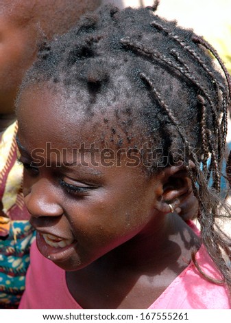 BANJUL, GAMBIA - SEPTEMBER 12: Portrait of unidentified Mandinka child, September 12, 2005 in Banjul, Gambia. The major ethnic group in Gambia is the Mandinka - 42% of the total population.