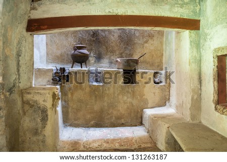 medieval rustic kitchen with fireplace