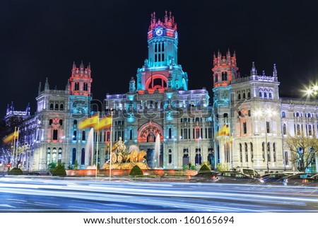 Cibeles square at Christmas Madrid Spain Cibeles fountain in front of the The City Hall or the former Palace of Communications under a special illumination Cibeles square at Christmas Madrid Spain Cibeles fountain in front of the The City Hall or the former Palace of Communications under a special illumination