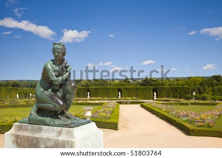 Bronze statue of Venus (Roman Goddess of love and beauty) in Versailles Chateau gardens. France