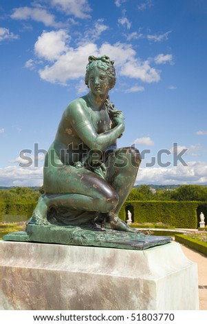 Bronze statue of Venus (Roman Goddess of love and beauty) in Versailles Chateau gardens. France