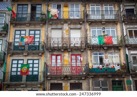 Old houses of Porto with flags in the balconies, Portugal