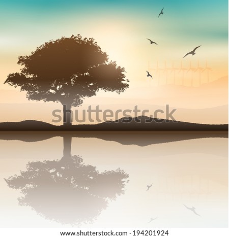 Tree landscape with wind turbines in the background
