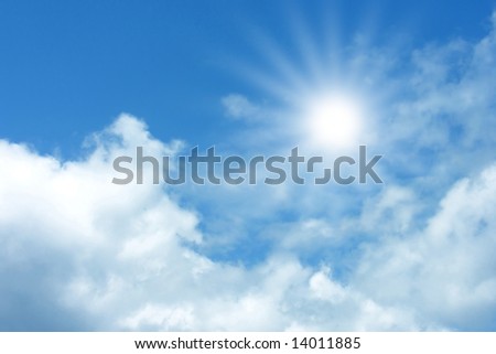 Background of blue sky with fluffy white clouds