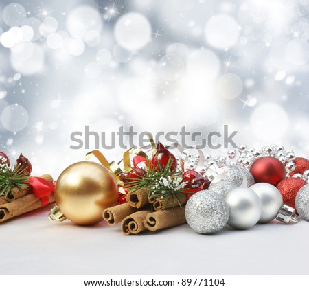 Decorations on a glittery Christmas background with stars and bokeh lights